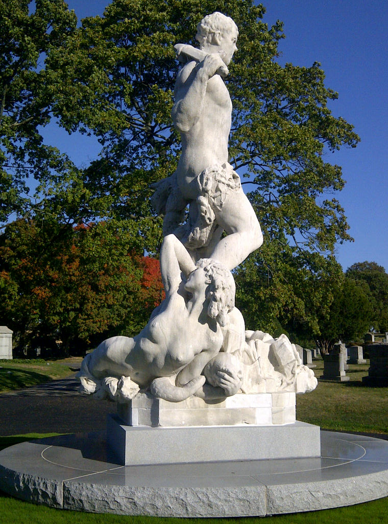 A side view of the statue shows the nude allegorical figure of vice (or maybe corruption)