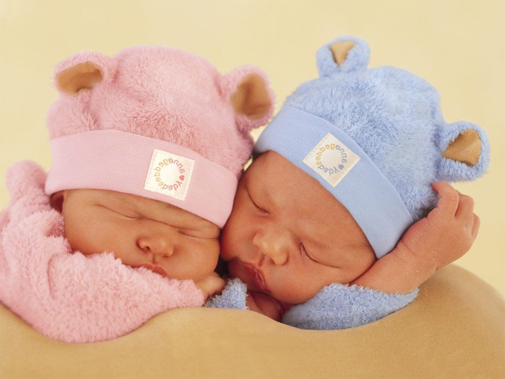 two-little-sleeping-babies.-One-with-pink-and-one-with-blue-clothes-and-hat-Beautiful-Baby-Wallpapers